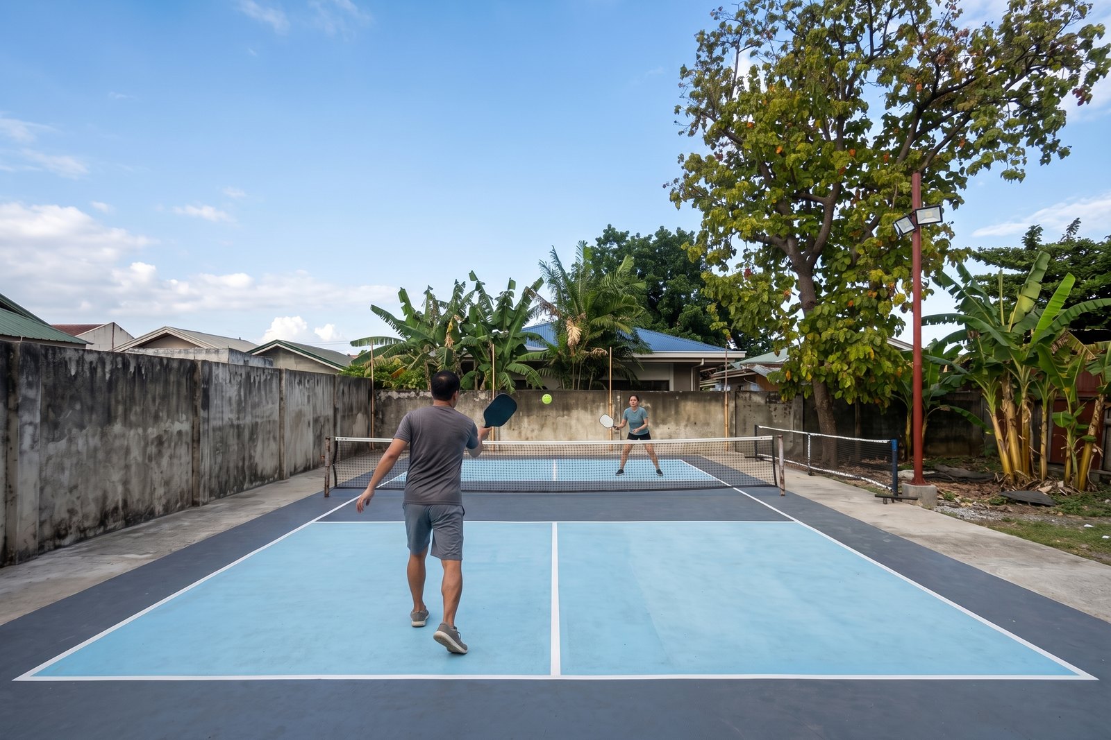 Dink Yard court at play, floodlit night rally